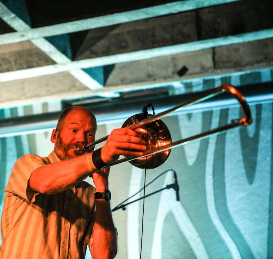 Shawn Neary playing trombone during a Cloud Cult show in Portland