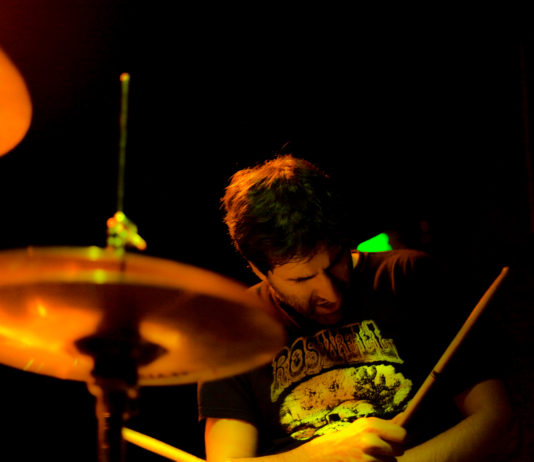 Drumming In A Roswell T-Shirt